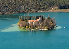 Photo of aerial view of Brodarica village near Sibenik beach and coastline, Dalmatia region of Croatia.