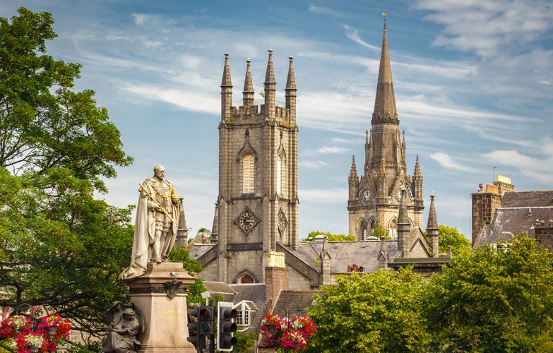 Photo of Statue of Edward VII with Former South Church with Kirk of St Nicholas (Triple Kirk) in the background, in Aberdeen, Scotland, UK.