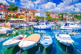 photo of aerial panoramic view of beautiful town of Lovran and sea walkway in Croatia.