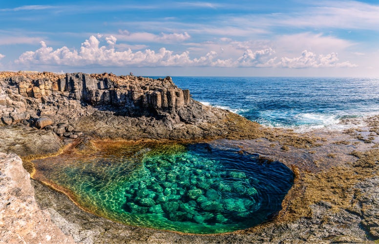 Photo of the natural pools at Caleta de Fuste, Fuerteventura: an oasis of calm with crystal-clear waters, framed by volcanic cliffs and idyllic landscapes, Spain.