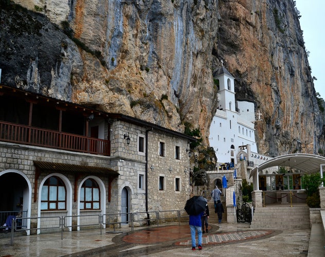 photo of view of Ostrog Monastery on rainy day, Montenegro.