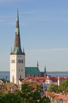 Scenic summer view of the Old Town and sea port harbor in Tallinn, Estonia.