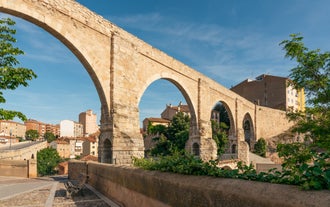 photo of summer view of Teruel with landmarks (Cathedral of Santa María de Mediavilla, Mausoleum of the Amantes) in Aragon, Spain.