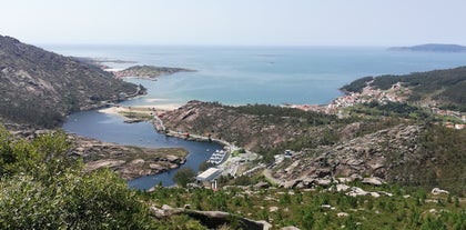 photo of aerial view of a harbor Fisterra is on Cape Finisterre in Galicia, Spain.