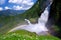 Photo of beautiful rainbow in Krimml Waterfalls and the surroundings forest in Krimml, Austria.