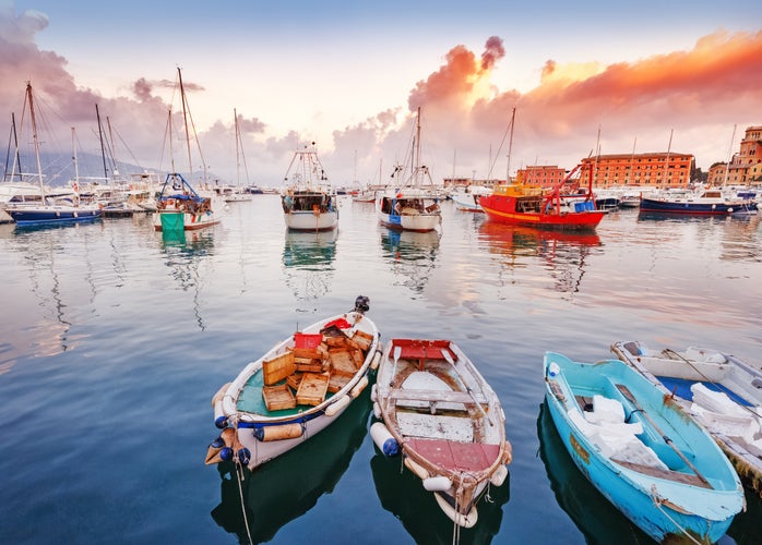 Photo of Santa Margherita Ligure, Italy, Rapallo region. amazing sunset scenery with boats and yachts.