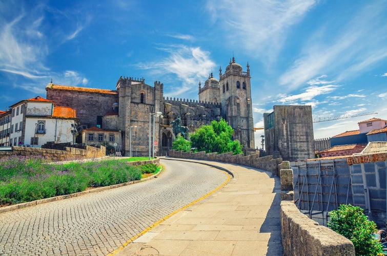 Photo of Porto Cathedral Roman Catholic church or Se do Porto and cobblestone road in Porto Oporto city historical centre, Norte or Northern Portugal.