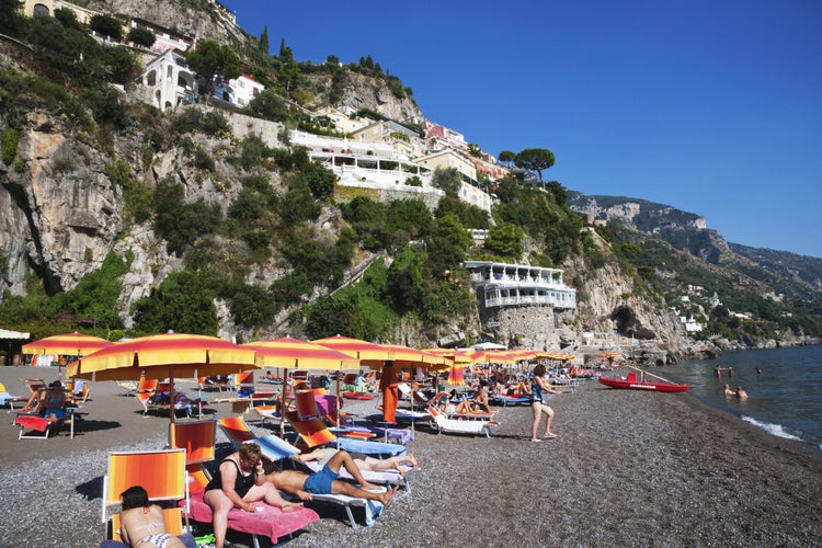 Tourists on the beach, Amalfi, Province Of Salerno, Gulf Of Salerno, Tyrrhenian Sea, Campania, Italy.