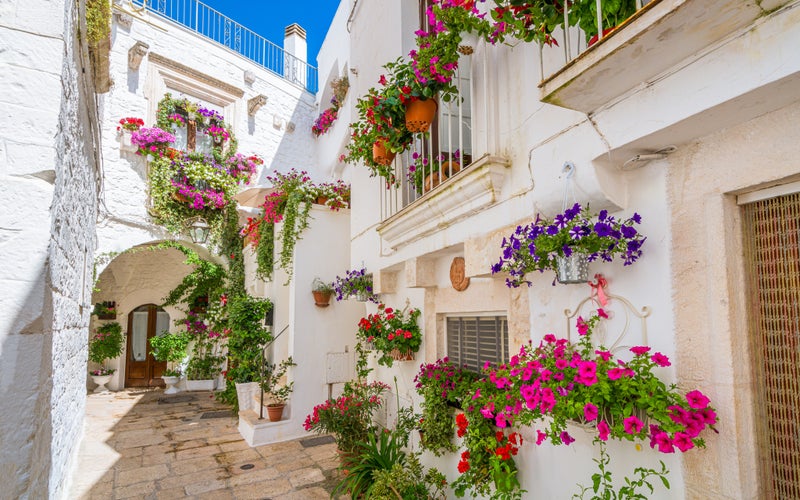 Ostuni white town skyline at sunset, Brindisi, Apulia southern Italy. Europe.