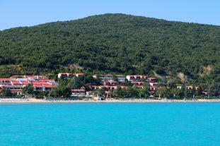 Photo of panoramic aerial view over small ancient resort town of Pomorie with old European small houses , Bulgaria.