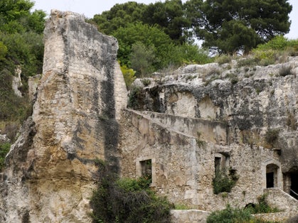 Ear of dionysus and Cave of the Nymphaeum (Grotta del Ninfeo) artificial cave on Greek Roman theater in Syracuse, Italy.