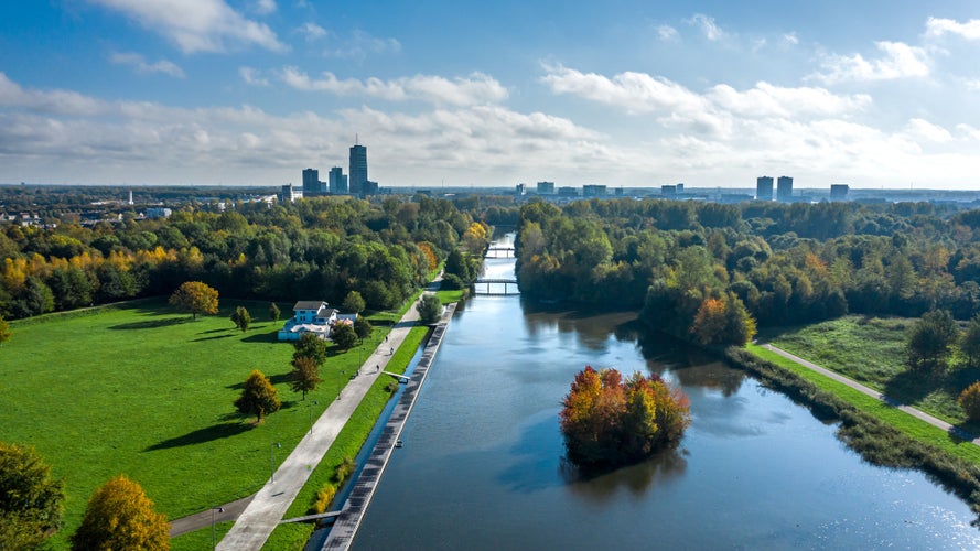 Beatrix park with city buildings on background in Almere, The Netherlands. Shot in autumn. Aerial view.