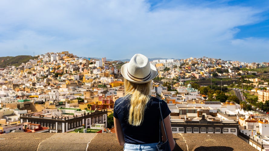 Photo of traveler woman enjoying cityscape Las Palmas Gran Canaria, Spain.