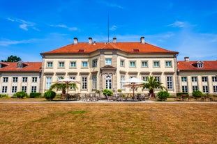 Photo of panorama of New City Hall in Hannover in a beautiful summer day, Germany.