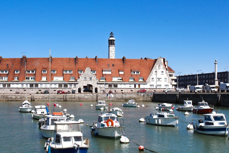 Calais lighthouse and port wharf in the north of France