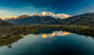 photo of French alps mountain and Saint-Gervais-les-Bains village, in spring in France.