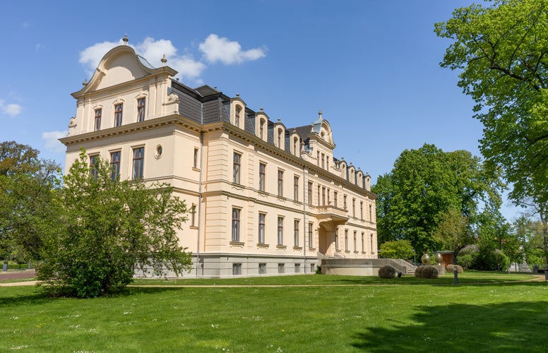 photo of view of Ribbeck Castle in Nauen, Brandenburg, Germany in spring