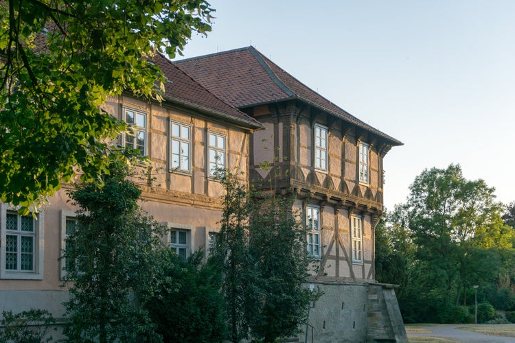 photo of view of old castle of wolfsburg - fallersleben, germany in natural evening light