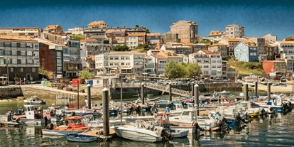 Photo of aerial panoramic view of Lugo galician city with buildings and landscape, Spain.