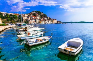 Photo of aerial view of Brodarica village near Sibenik beach and coastline, Dalmatia region of Croatia.