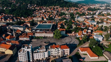 Photo of beautiful aerial view from uphill towards the town of Visoko in Bosnia and Herzegovina.