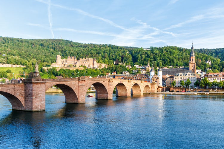 photo of view of Heidelberg with castle, Neckar river and old town bridge in Heidelberg, Germany.