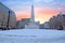 photo of snowy Damsquare in Amsterdam the Netherlands with the National Monument in winter.