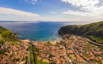 Aerial drone view of Camara de Lobos village, Madeira.