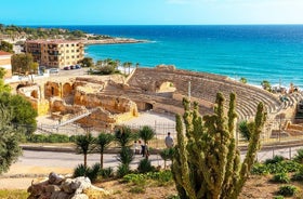 Photo of aerial view of coast at Calafell cityscape with modern apartment buildings, Spain.