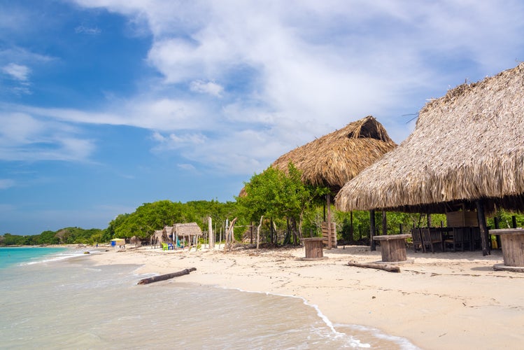 Simple beach huts on beach at Playa Blanca near Cartagena, Colombia