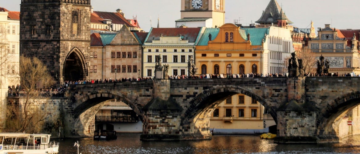 Charles Bridge over the Vltava River in Prague filled with tourists during Czechia in July..jpg