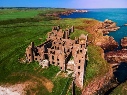 Photo of New Slains Castle in Cruden bay, Scotland, United Kingdom .