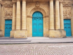 Photo of Metz city view of Petit Saulcy an Temple Neuf and Moselle River in Summer, France.