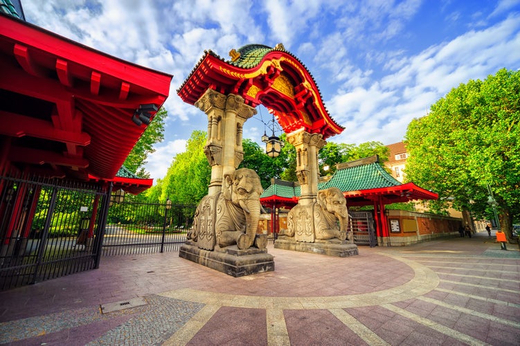 Photo of stone elephants and the arch on the entrance to the Berlin Zoological Garden, Germany.