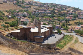 Hot air balloons flying over Uchisar Castle. Cappadocia. Nevsehir Province. Turkey.