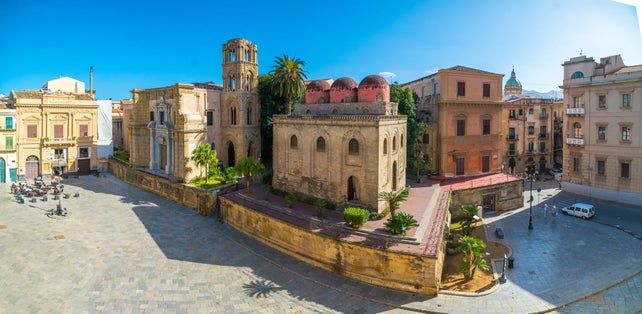 photo of Panoramic view of Bellini Square, Santa Maria dell'Ammiraglio Church known as Martorana Church, San Cataldo church in the center of Palermo visited by many tourists .