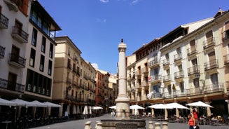 photo of summer view of Teruel with landmarks (Cathedral of Santa María de Mediavilla, Mausoleum of the Amantes) in Aragon, Spain.