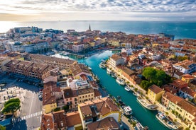 Photo of Trieste lighthouse Phare de la Victoire and cityscape panoramic aerial view, Friuli Venezia Giulia region of Italy.