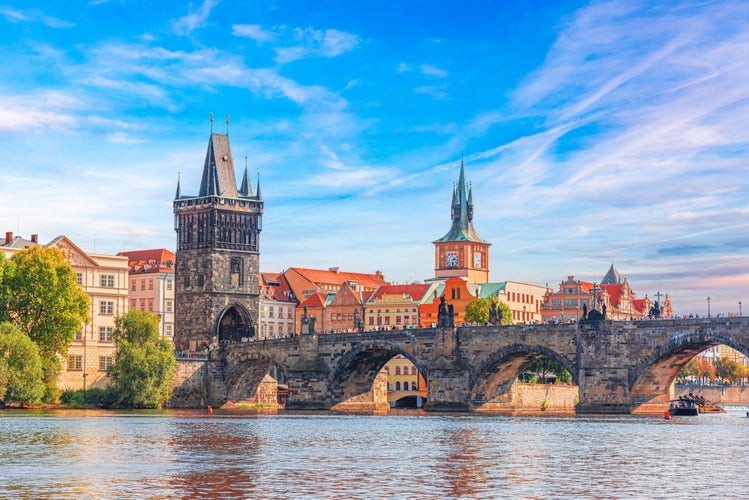 Photo of Prague - Charles bridge, Czech Republic. Scenic aerial sunset on the architecture of the Old Town Pier and Charles Bridge over the Vltava River in Prague, Czech Republic.