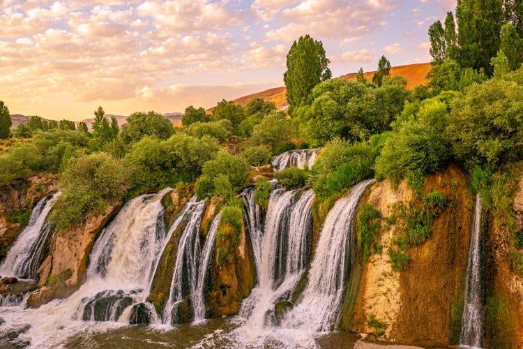 photo of view of Muradiye waterfall, which is located on the Van - Dogubeyazit highway, a natural wonder often visited by tourists in Van, Turkey