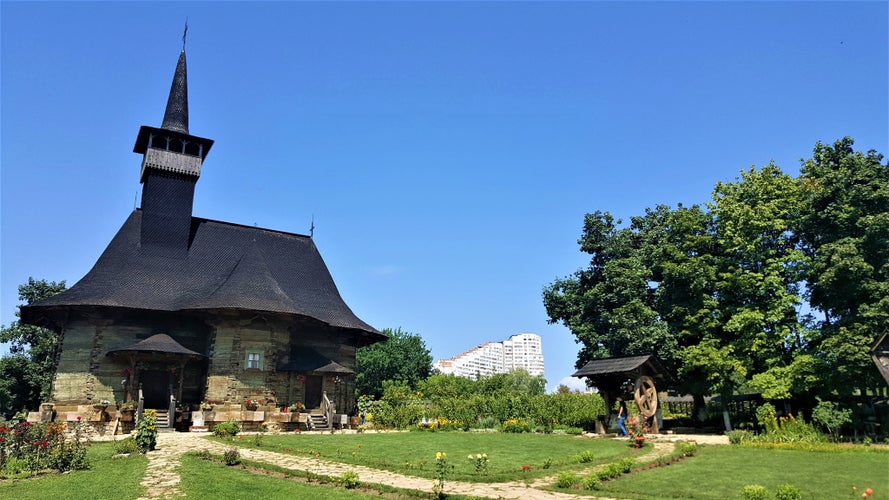 Village museum. Wooden church of the Dormition of Mary of Hirișeni, built in 1642 and restored recently. Chisinau City Gates (Portile Orasului) visible.