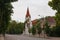 Photo of Silute Evangelical Lutheran Church, located in the center of Silute. The height of the church tower reaches 50 m, and the tower clock is the largest in Lithuania.