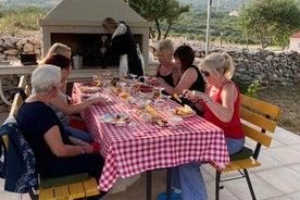 Visite d'un vignoble à la gestion familiale et dégustation de vins / délices primés