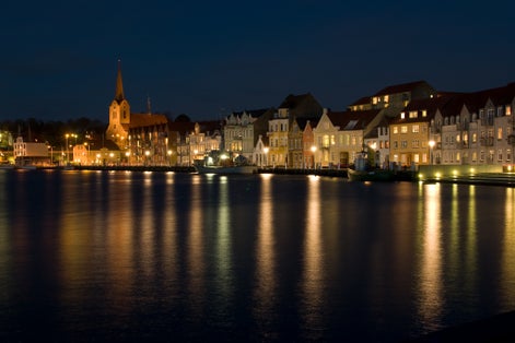 Harbour. the lights of the evening city reflexed in the river.Sonderborg , Denmark