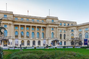 Antique building view in Old Town Bucharest city - capital of Romania and Dambrovita river. Bucharest, Romania, Europe.