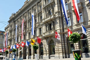 Panoramic view of historic Zurich city center with famous Fraumunster, Grossmunster and St. Peter and river Limmat at Lake Zurich on a sunny day with clouds in summer, Canton of Zurich, Switzerland