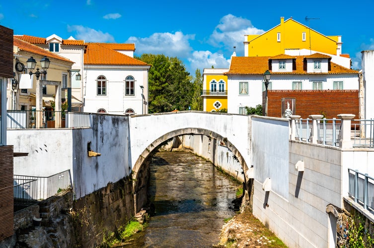 Photo of Arch bridge across the Alcobaca river in Alcobaca, Portugal.