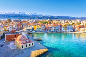 Photo of aerial view of Chania with the amazing lighthouse, mosque, venetian shipyards, Crete, Greece.