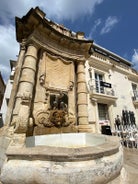 Aerial view of Lady of Mount Carmel church, St.Paul's Cathedral in Valletta embankment city center, Malta.