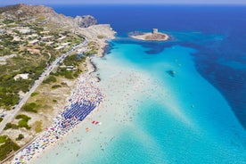 Photo of aerial view of Alghero on a beautiful day with harbor and open sea, Italy.